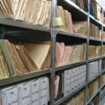 A picture of paper archives in a warehouse.