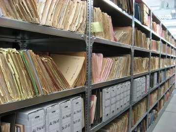 A picture of paper archives in a warehouse.